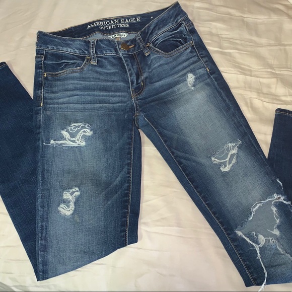 Medium wash ripped “super stretch” skinny jeans - Picture 1 of 2